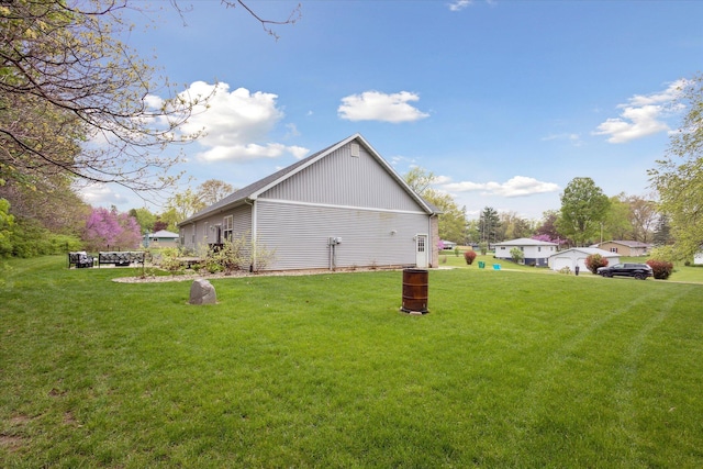 view of property exterior featuring a yard