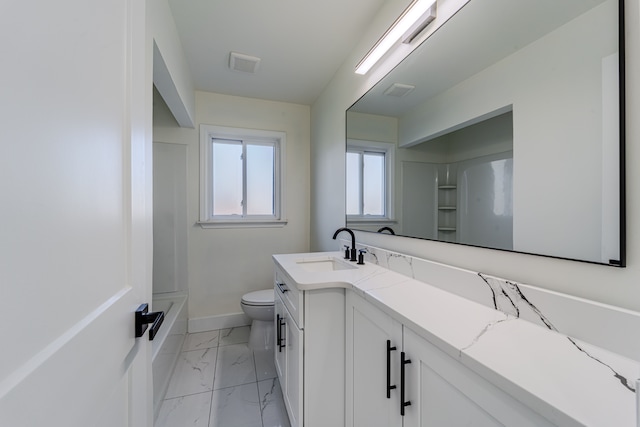 full bathroom featuring baseboards, marble finish floor, toilet, vanity, and a shower