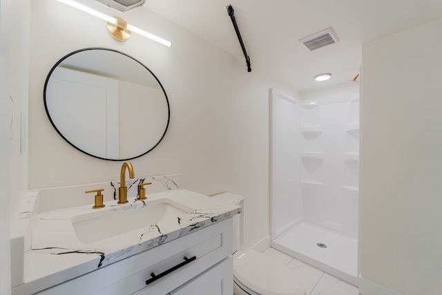 bathroom with toilet, a stall shower, visible vents, marble finish floor, and vanity