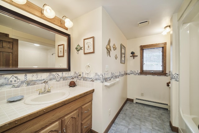 bathroom with a baseboard radiator, visible vents, baseboards, backsplash, and vanity