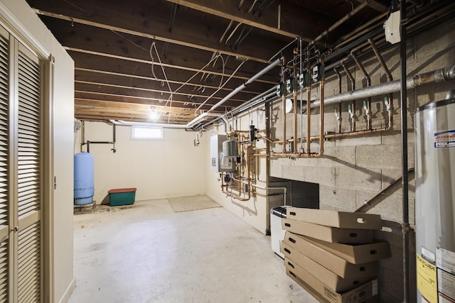below grade area featuring water heater