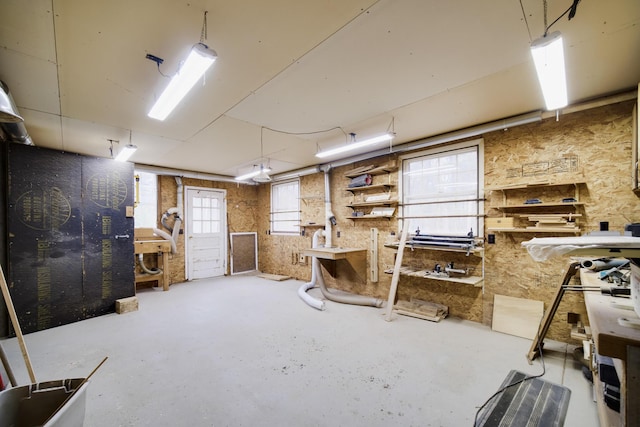 basement with a workshop area