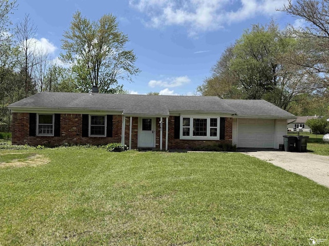8367 S Douglas Rd, Bedford, MI 48144 - single story home with an attached garage, concrete driveway, brick siding, and a front yard