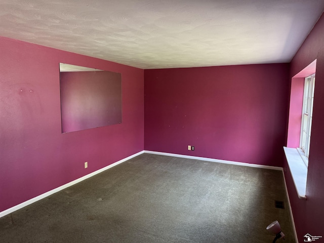 8367 S Douglas Rd, Bedford, MI 48144 - carpeted empty room featuring baseboards and visible vents