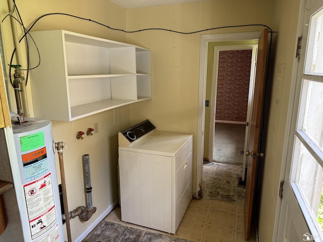 8367 S Douglas Rd, Bedford, MI 48144 - clothes washing area featuring washer / dryer, laundry area, and gas water heater