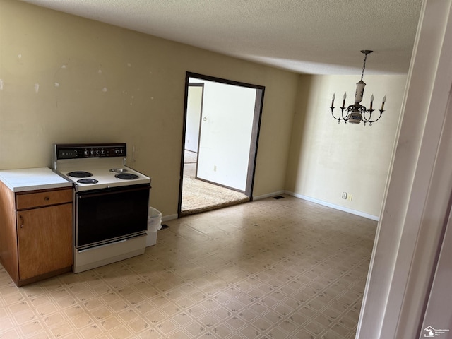 8367 S Douglas Rd, Bedford, MI 48144 - kitchen featuring an inviting chandelier, brown cabinets, light floors, electric range oven, and light countertops