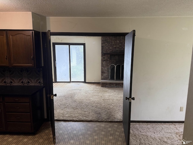 8367 S Douglas Rd, Bedford, MI 48144 - hall featuring carpet flooring and a textured ceiling