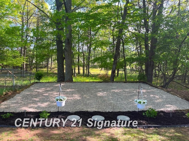 7229 S Lake Bluff 0.5 Dr, Gladstone, MI 49837 - view of yard with fence
