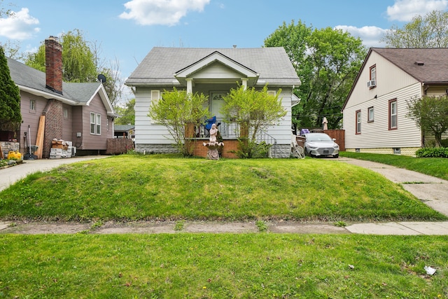 933 Cameron Ave, Pontiac, MI 48340 - bungalow with covered porch and a front lawn