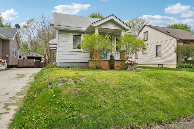 933 Cameron Ave, Pontiac, MI 48340 - view of front facade featuring a front yard and covered porch