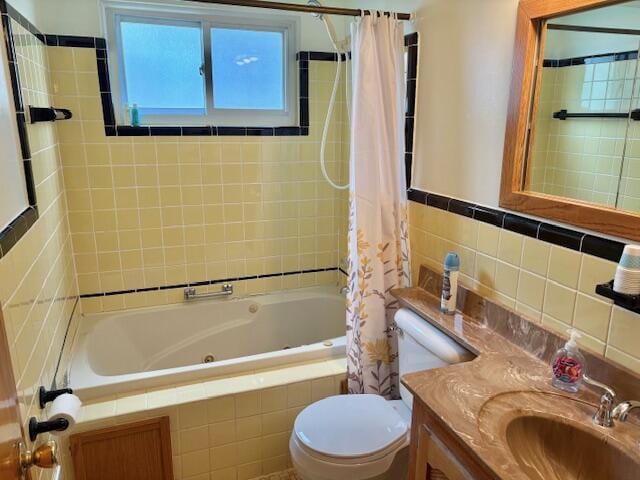 full bathroom with toilet, tile walls, vanity, and a combined bath / shower with jetted tub