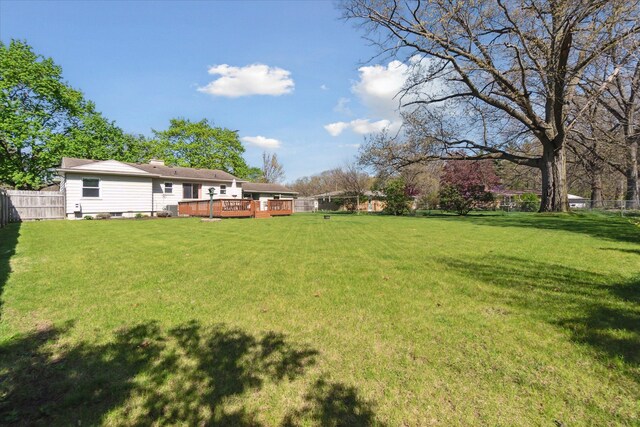 view of yard with a deck