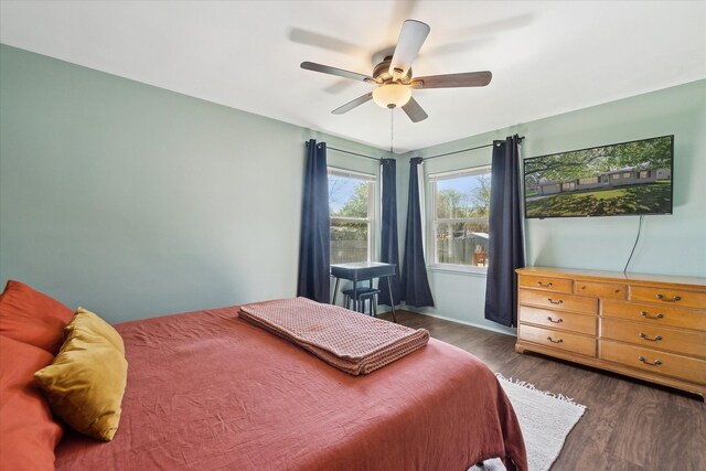 bedroom with wood finished floors and ceiling fan