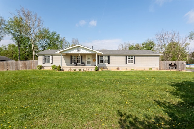 view of front of house with a porch, fence, and a front yard