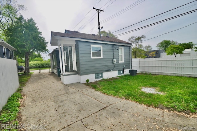 23027 Powell Ave, Hazel Park, MI 48030 - rear view of property featuring central air condition unit