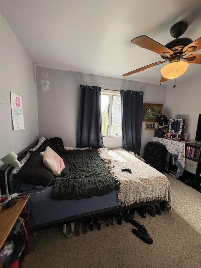 bedroom featuring carpet and ceiling fan