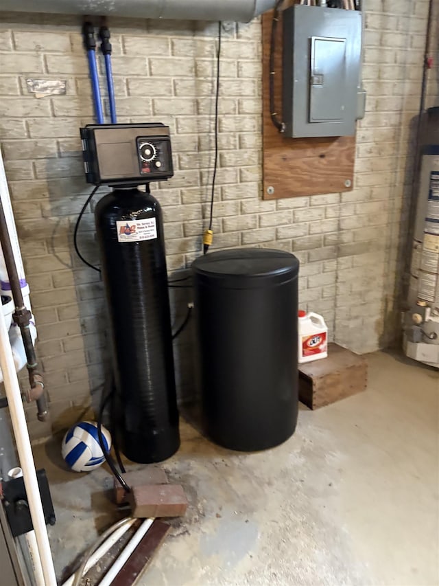 utility room with water heater and electric panel