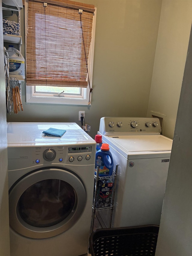 laundry area featuring washing machine and dryer