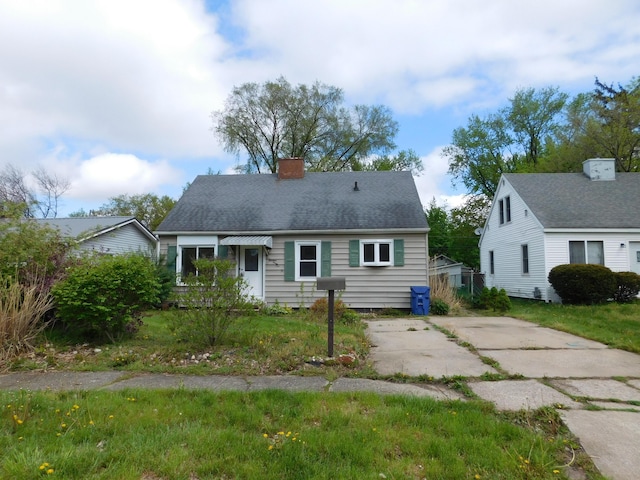 view of front of property featuring a chimney