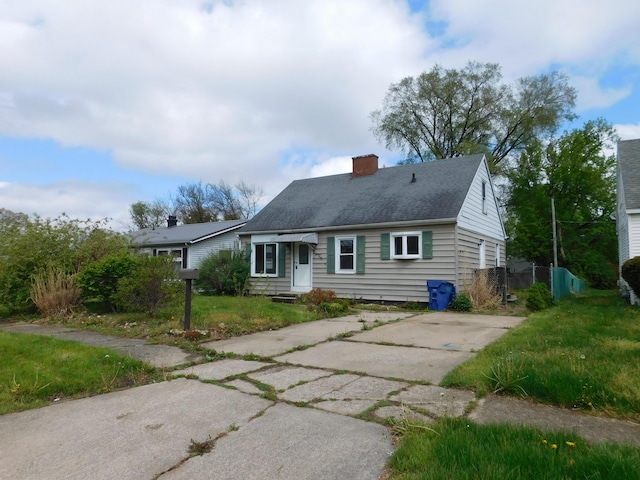 view of front of home with a chimney