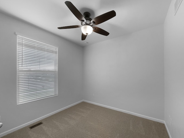 8351 Ardmoor Dr, Ypsilanti, MI 48198 - empty room with ceiling fan, carpet floors, baseboards, and visible vents