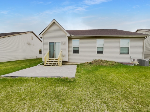 8351 Ardmoor Dr, Ypsilanti, MI 48198 - rear view of property with a yard, a patio area, and entry steps