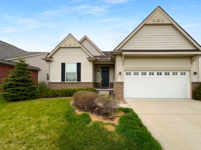 8351 Ardmoor Dr, Ypsilanti, MI 48198 - view of front facade with concrete driveway, a garage, brick siding, and a front lawn