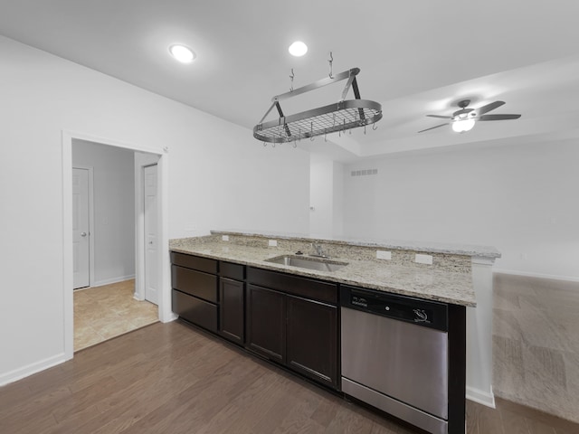 8351 Ardmoor Dr, Ypsilanti, MI 48198 - kitchen with a peninsula, light stone counters, a sink, and stainless steel dishwasher