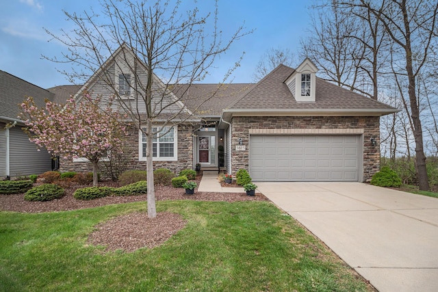 view of front of property featuring concrete driveway, an attached garage, and stone siding