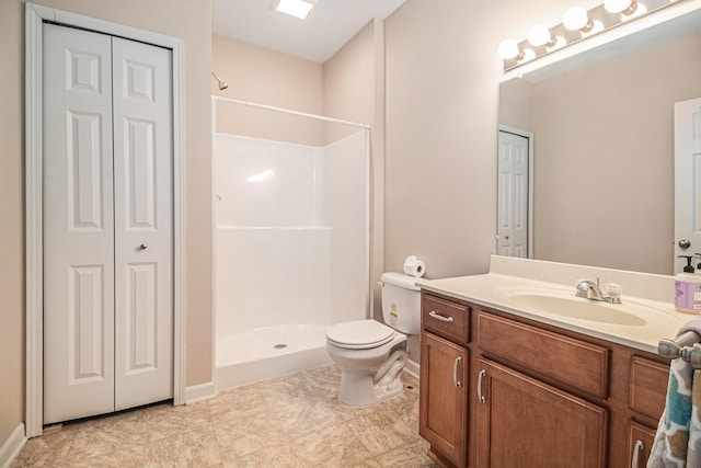 full bathroom featuring walk in shower, a closet, toilet, and vanity