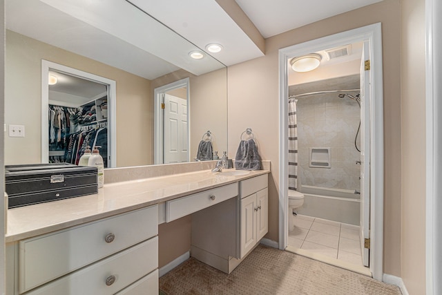 full bath with shower / bath combo with shower curtain, toilet, baseboards, visible vents, and vanity