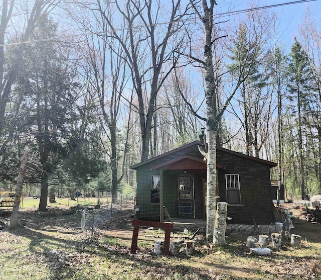 view of side of home with a porch