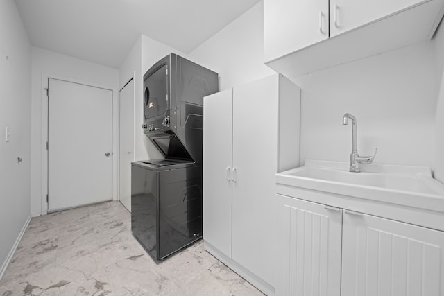 29513 Sierra Pointe Cir, Farmington Hills, MI 48331 - washroom featuring stacked washer / drying machine, cabinet space, light marble finish flooring, and baseboards