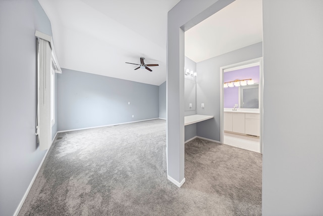 29513 Sierra Pointe Cir, Farmington Hills, MI 48331 - unfurnished bedroom featuring carpet, baseboards, a ceiling fan, ensuite bath, and a sink