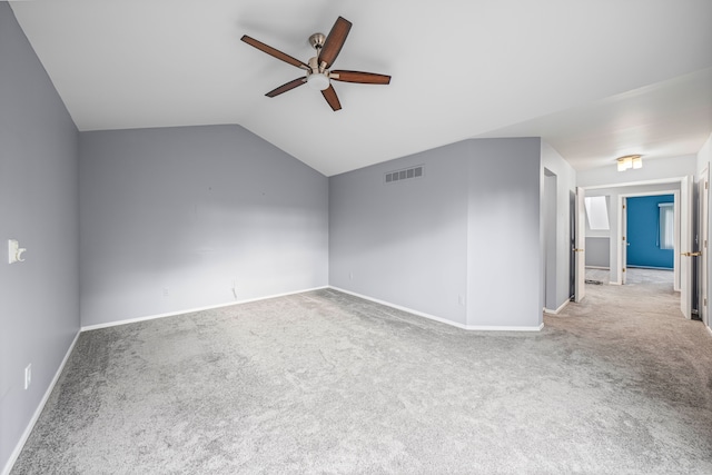 29513 Sierra Pointe Cir, Farmington Hills, MI 48331 - carpeted empty room with ceiling fan, baseboards, and lofted ceiling