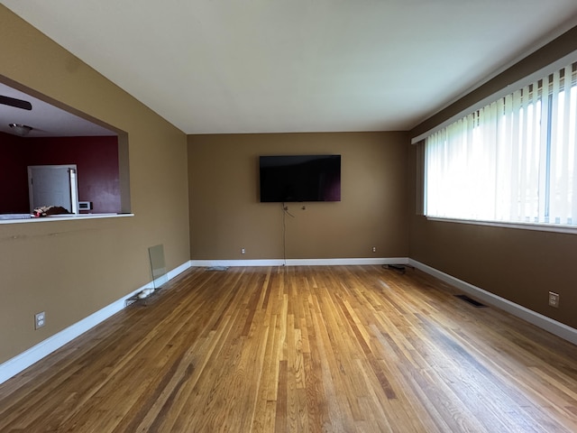 31534 Stricker Dr, Warren, MI 48088 - unfurnished living room with wood finished floors and baseboards