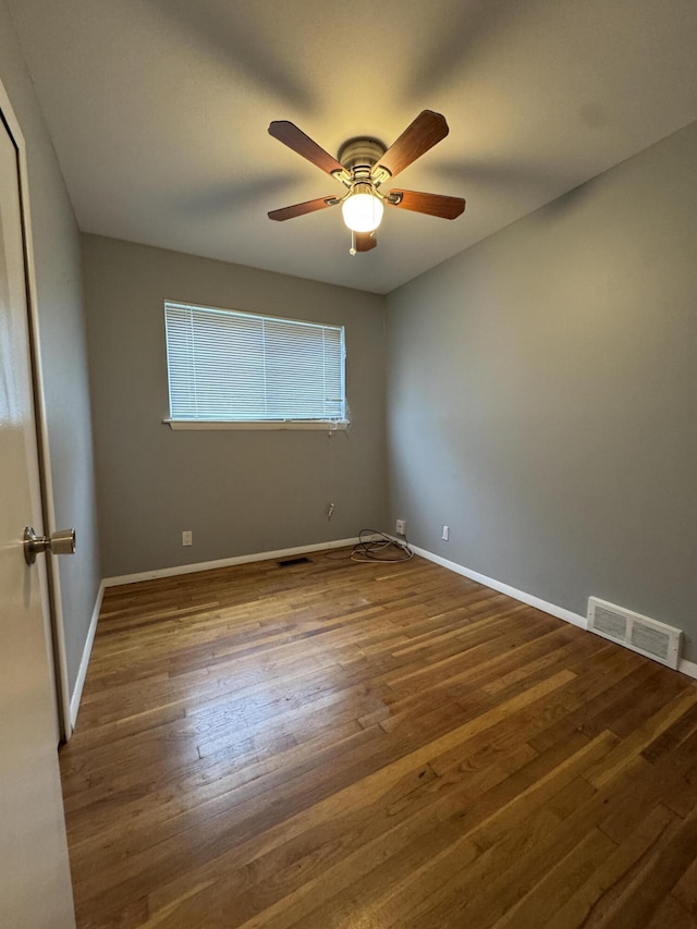 31534 Stricker Dr, Warren, MI 48088 - unfurnished room featuring wood finished floors, a ceiling fan, and baseboards