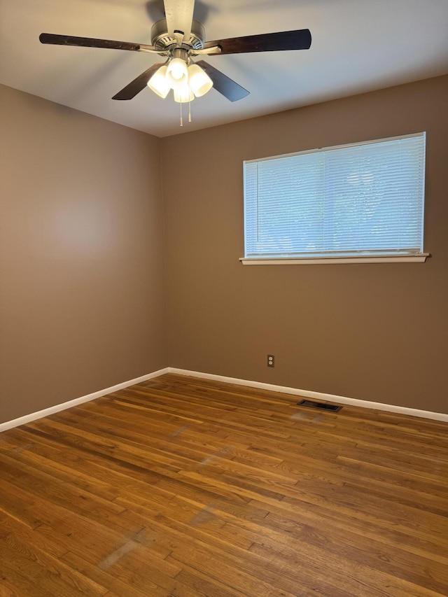 31534 Stricker Dr, Warren, MI 48088 - unfurnished room featuring wood finished floors, baseboards, and ceiling fan