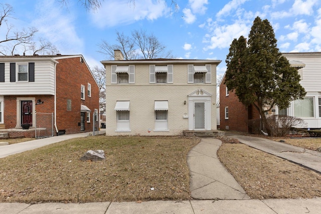 16760 Greenview Ave, Detroit, MI 48219 - view of front of property with brick siding and a chimney