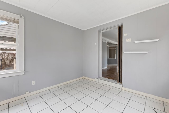 16760 Greenview Ave, Detroit, MI 48219 - empty room featuring crown molding, baseboards, and light tile patterned flooring