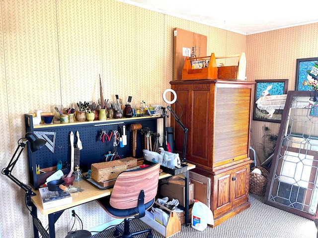 office with wallpapered walls and ornamental molding