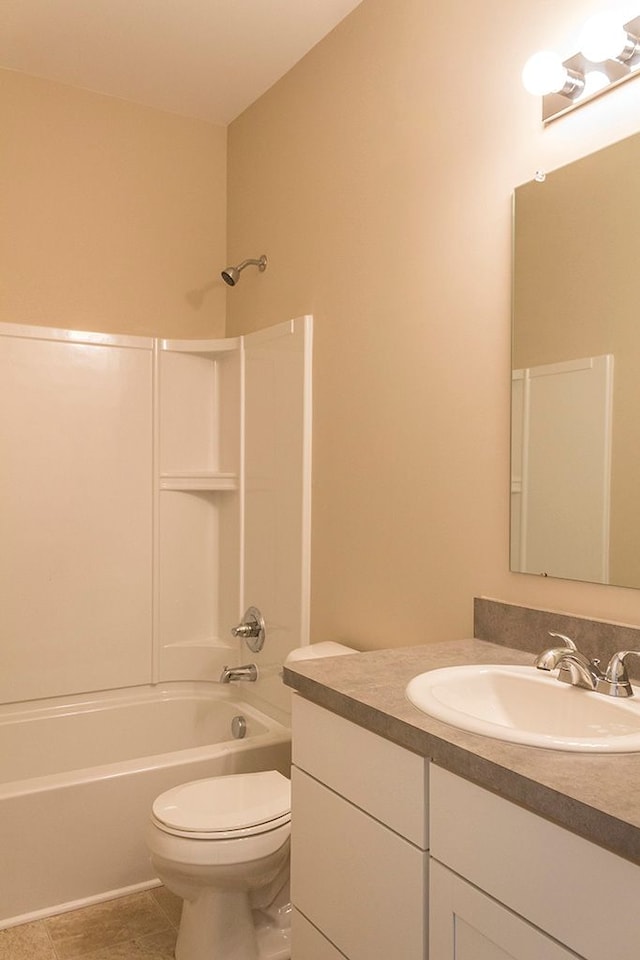 full bath featuring shower / bathing tub combination, vanity, toilet, and tile patterned floors