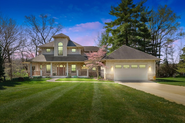 12324 Cranes Ave, Richland, MI 49083 - view of front facade featuring a porch, stone siding, driveway, a garage, and a front yard