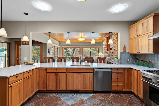 12324 Cranes Ave, Richland, MI 49083 - kitchen featuring hanging light fixtures, a sink, stainless steel appliances, decorative backsplash, and light stone counters