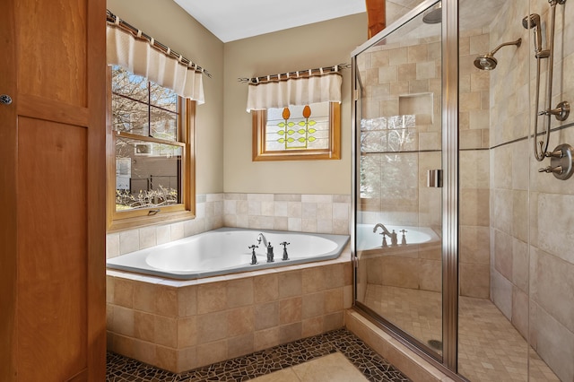 12324 Cranes Ave, Richland, MI 49083 - bathroom featuring tile patterned floors, a garden tub, and a shower stall