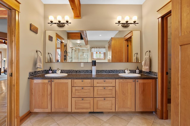 12324 Cranes Ave, Richland, MI 49083 - full bathroom featuring double vanity, a stall shower, and a sink