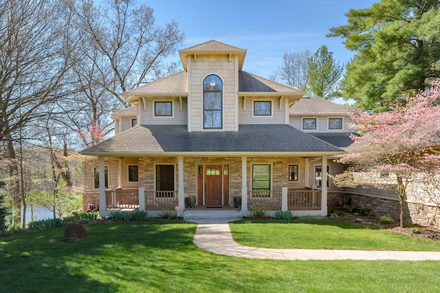 12324 Cranes Ave, Richland, MI 49083 - view of front facade with a shingled roof, a porch, a front lawn, and stone siding