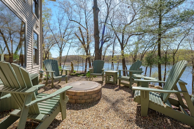 12324 Cranes Ave, Richland, MI 49083 - view of patio / terrace featuring an outdoor fire pit and a water view