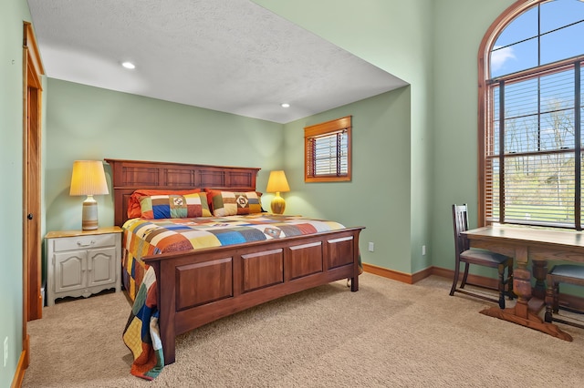 12324 Cranes Ave, Richland, MI 49083 - bedroom with a textured ceiling, baseboards, recessed lighting, and light colored carpet