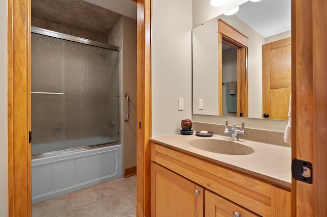 12324 Cranes Ave, Richland, MI 49083 - bathroom featuring vanity, tile patterned flooring, and enclosed tub / shower combo